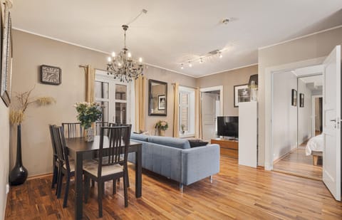 Open-concept living space with a dining area and a comfortable seating area.