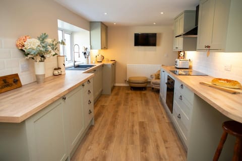 Kitchen with armchair and foot stool