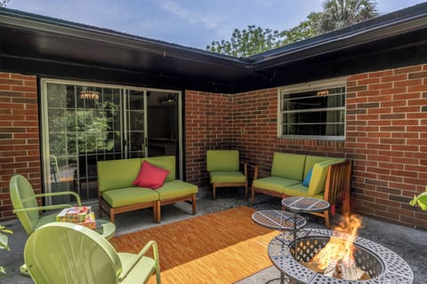 Patio with plush seating and firepit