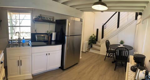 Kitchenette with dining area and coffee/tea bar