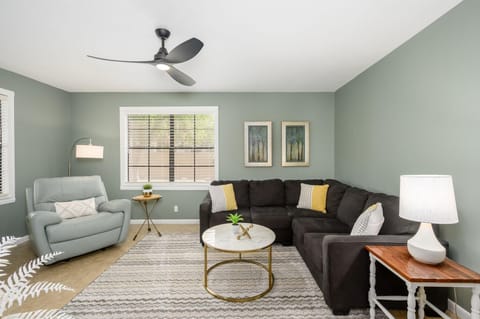 Lots of comfortable seating in living room.
