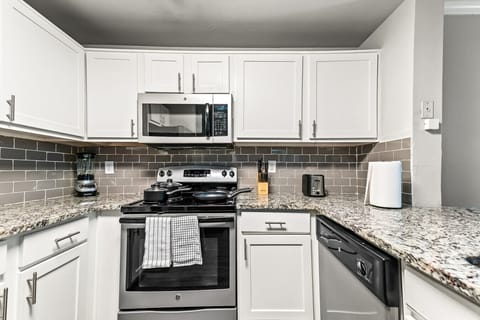 You can almost hear the sizzle of ingredients as you cook in the well-equipped kitchen, where every detail is designed for convenience.