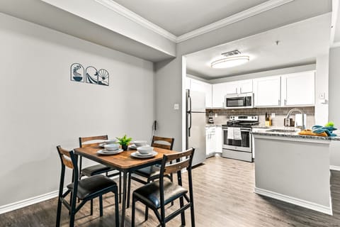 As you take your seat, the dining room's sophisticated design sets the stage for memorable meals and conversations.