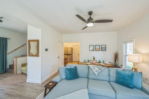 Gather and relax in this open, light-filled living room.