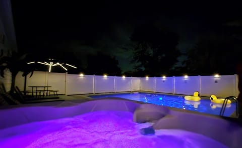 Hot tub available year round out by seasonal pool.