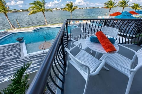 Sip morning coffee on the balcony with sparkling water views.
