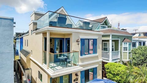 Exterior - 3 story with rooftop deck. Newly painted.