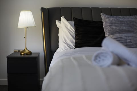 Relax and unwind in this cosy double bedroom, designed for a peaceful night’s sleep.