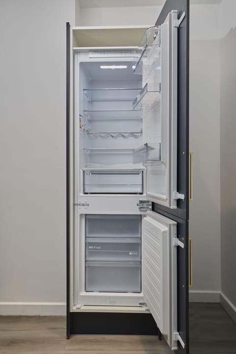 Clean and functional kitchen designed for convenience and ease.