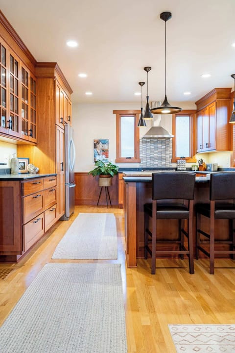 Kitchen has ample counter space & bar seating.
