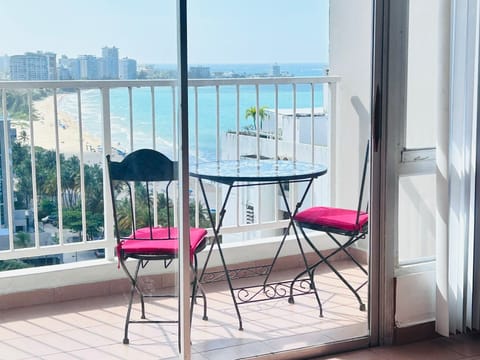 View of the beach from inside the apartment