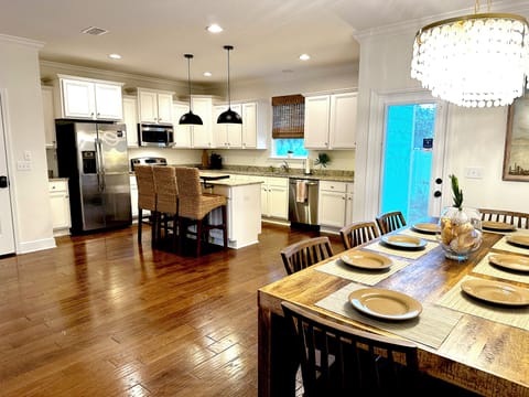 Dining table seats 8 comfortably.