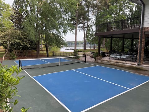 Have a blast with friends & family on the private, lakefront pickleball court!