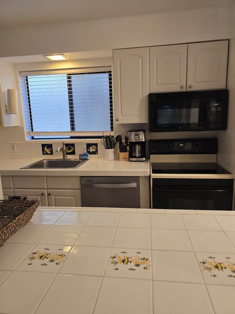 Kitchen, refrigerator, stove, oven, microwave, dishwasher, appliances.