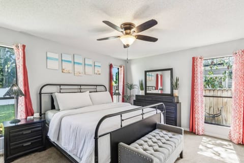 Owner's Suite: Bright ambiance with chic decor and a plush king bed for ultimate relaxation!