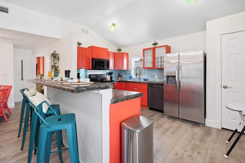 Cook in style! Our fully stocked kitchen features a large island, high-end appliances, and ample cabinetry for all your culinary creations.