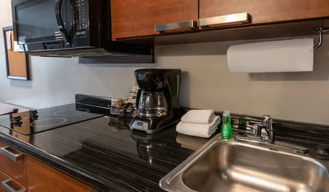 Start mornings with fresh coffee and simple in-room cooking.