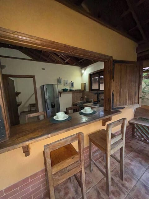 You can eat on the bar from the inside or outside. There’s also a table that fits 4 people outside next to the bar.