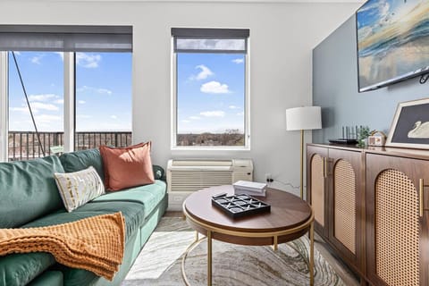 Living room area with wide windows and open space for exterior views