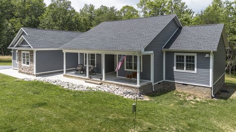 Exterior view of the home, featuring a spacious front porch.