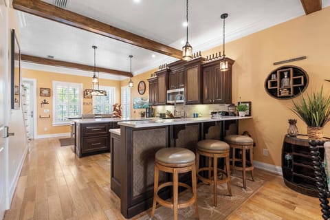 Kitchen with eat-in bar seating