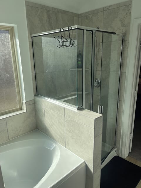 Ample towel hanging racks and soap and shampoo provided.