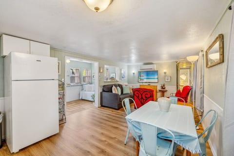 Looking from the kitchen into the sunroom and living room