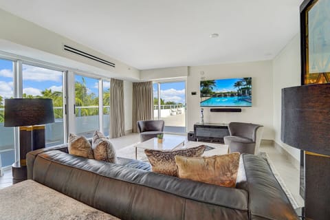 Unwind on the sofa with breezy views and big-screen comfort.