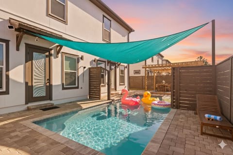 This is a large pool that runs the length of the building. As pictured, there`s a divide that can be pulled across to close the pool so each side has their own privacy. It`s about 40ft long and about 20ft on each side when the divider is up.