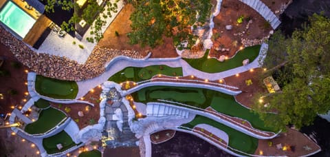 Winding greens and serene forest views — mini golf has never looked this dreamy.