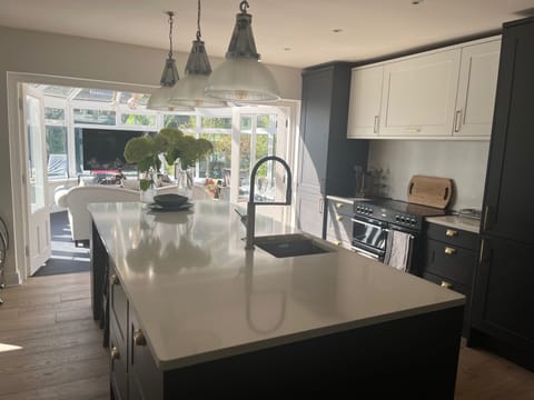 Kitchen and conservatory area