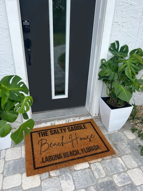 Step right up to the Salty Saddle Beach House! Life is better at the beach.