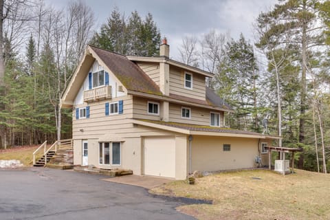 Property Exterior | 3-Story Home | Wooded Surroundings