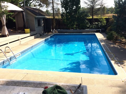 Pool, 2 large decks and basketball court in fenced in yard.