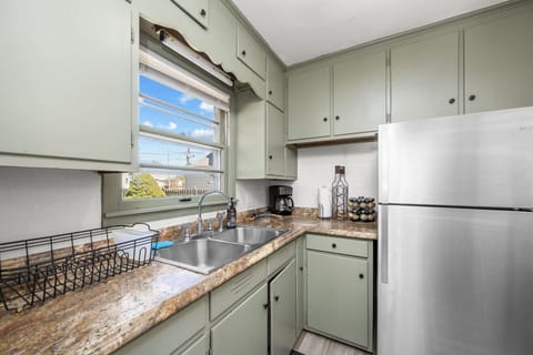 Take in natural light and serene backyard views while washing dishes, making everyday tasks feel refreshing and peaceful. Fuel your mornings with our coffee and tea setup! We provide a coffee pot, filters, coffee grounds, and numerous tea options!