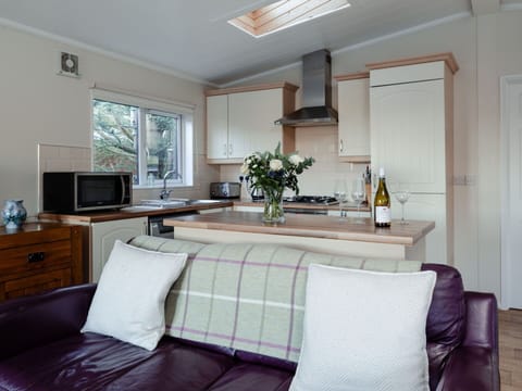 Furniture, Interior Design, Flooring, Room, Lighting, Ceiling, Floor, Cabinetry, Home, Kitchen Appliance