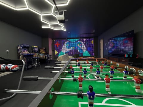 Enjoy the epic gameroom with Nintendo Switch, foosball, arcade games, pinball