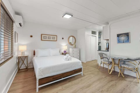 Lounge the day away & stream on the smart TV in the plush queen bed 