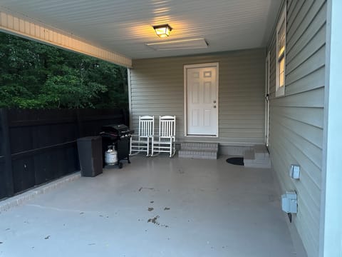 car port with propane grill 