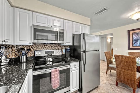 Granite countertops and stainless appliances ready for your favorite recipes.
