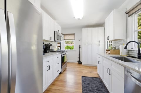 Open kitchen and dining area perfect for cooking and entertaining