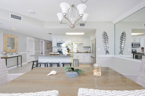 Stylish dining table adorned with a floral centerpiece, perfect for meals and conversations