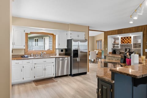 Fully stocked kitchen with picture window