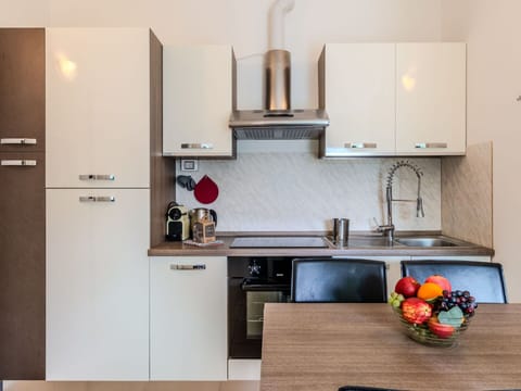 Kitchen Appliance, Kitchen, Countertop, Cabinetry, Major Appliance, Furniture, Home Appliance, Interior Design, Kitchen Stove, Wood