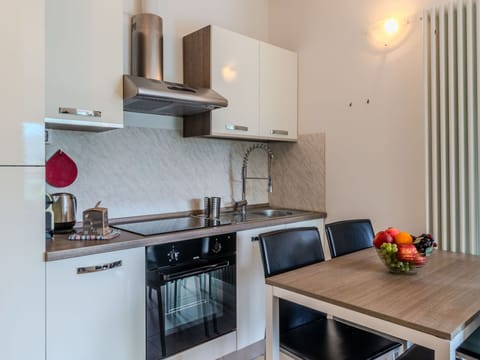 Countertop, Interior Design, Kitchen Appliance, Kitchen, Major Appliance, Furniture, Flooring, Cabinetry, Room, Floor