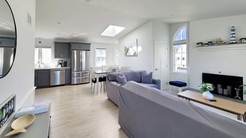Vaulted ceiling and skylight create and open and bright space
