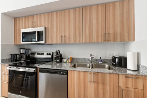 Prepare delicious meals in this modern kitchen with all the essentials.