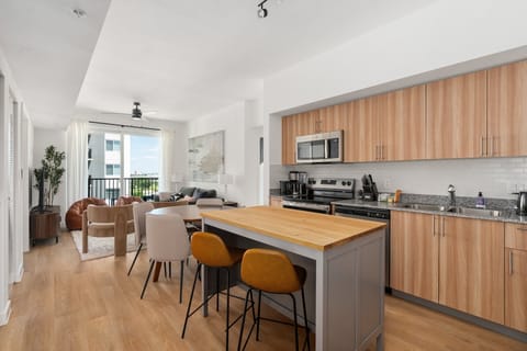 Whip up culinary delights in this modern kitchen with all the essentials.