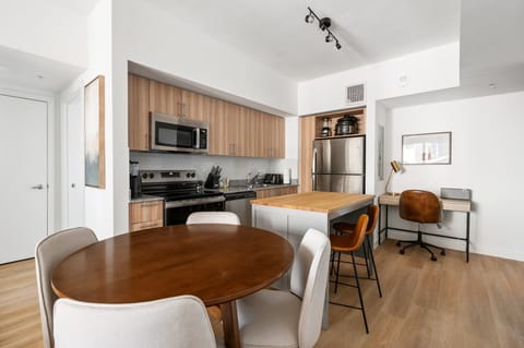 Craft tasty dishes in this contemporary kitchen with all the necessary amenities.