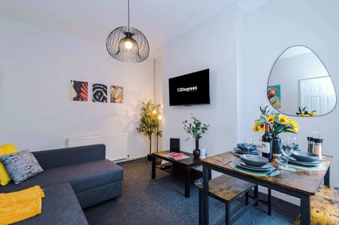 The colourful living room is open plan, allowing you to relax and dine seamlessly. It is equipped with a SMART TV, sofa bed and bench seating for you to enjoy a meal in the evening.